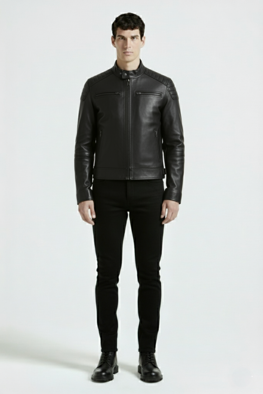Male model wearing Maverick Axton moto jacket, slim fit, styled with black t-shirt and black skinny jeans. Maverick Jacket.