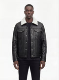 Male model wearing Maverick Corbin leather jacket, regular fit, styled with black crewneck t-shirt and black slim-fit trousers. Maverick Jacket.