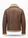 Rear view of Brown Leather Shearling Aviator Jacket showing vertical center seam and shearling hem trim. The Sterling by Maverick Jacket.