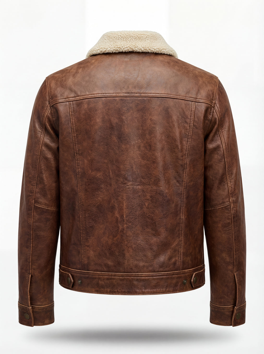 Men's Distressed Brown Leather Trucker Jacket with cream shearling collar and button-flap chest pockets, Front View. The Wyatt by Maverick Jacket.