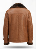 Rear view of Tan Leather Shearling Coat showing vertical center seam and horizontal yoke stitching. The Alistair by Maverick Jacket.