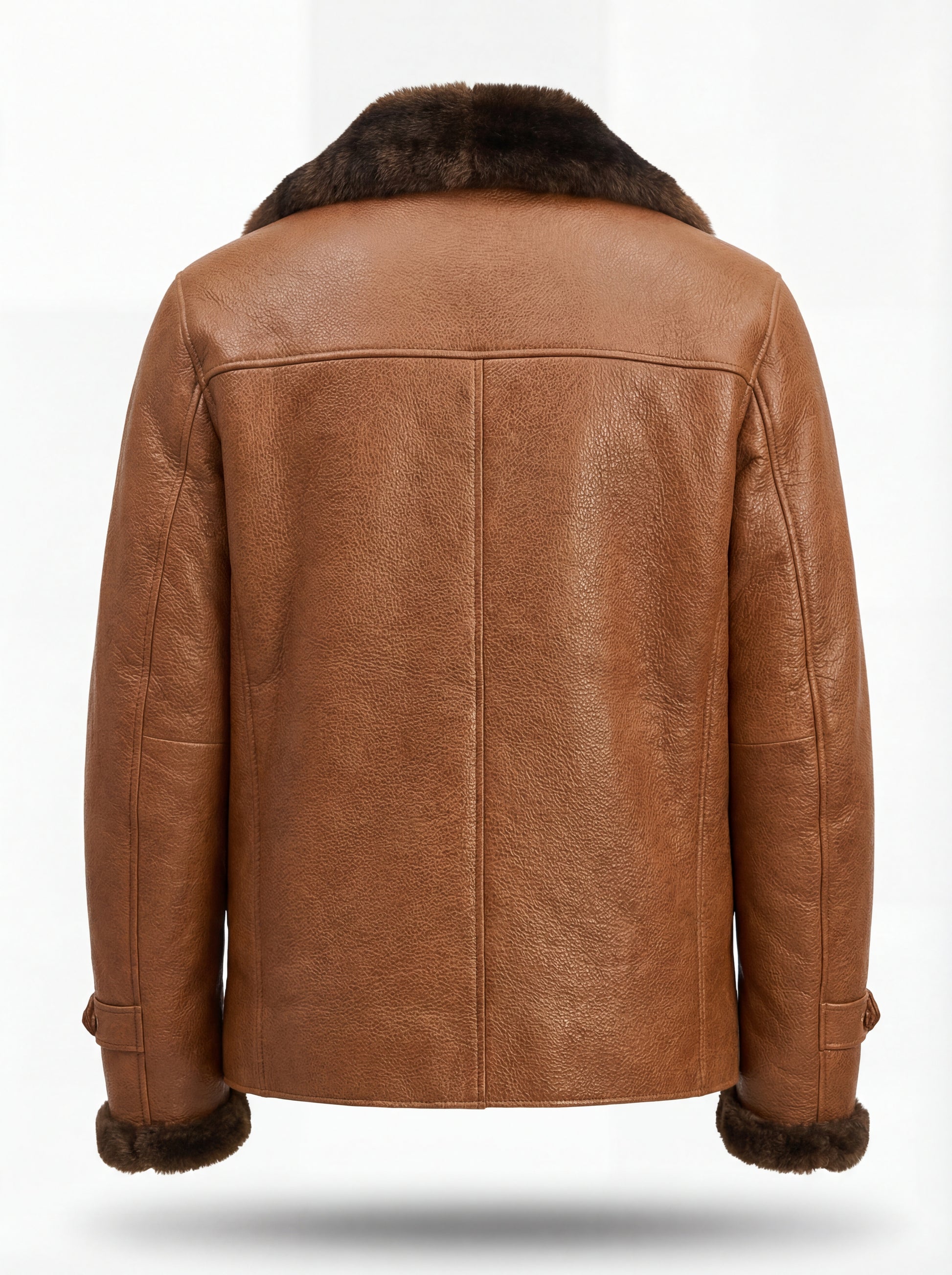 Rear view of Tan Leather Shearling Coat showing vertical center seam and horizontal yoke stitching. The Alistair by Maverick Jacket.