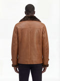 Rear view of male model wearing Maverick Alistair showing structured shoulder fit and clean back paneling. Maverick Jacket.
