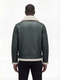Rear view of male model wearing Maverick Lorcan shearling aviator jacket showing structured shoulder fit and shearling-trimmed hem. Maverick Jacket.