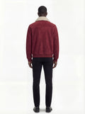 Rear view of male model wearing Maverick Rory suede bomber jacket showing structured shoulder fit and clean back paneling. Maverick Jacket.