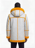 Rear view of male model wearing Maverick Axel Hooded Shearling Parka showing relaxed shoulder drape and bold fur hood styling. Maverick Jacket.
