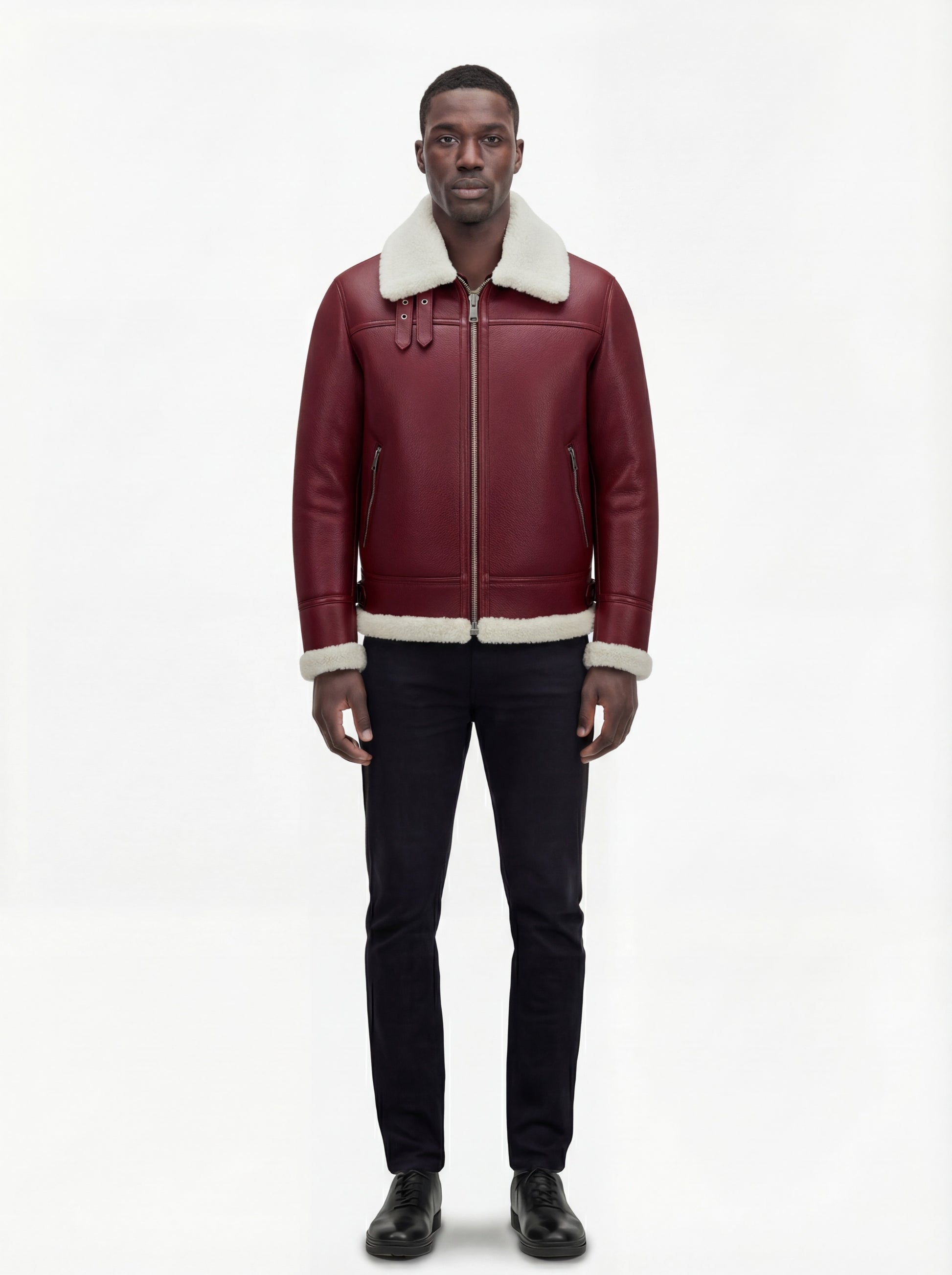 Male model wearing Maverick Cormac shearling aviator jacket, regular fit, styled with black slim-fit jeans. Maverick Jacket.