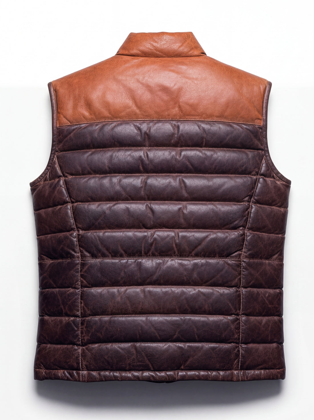 Men's black and brown two-tone leather puffer vest with horizontal baffle stitching and stand collar, Front View. The Caleb by Maverick Jacket.