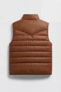 Rear view of tan western puffer vest showing pointed western back yoke and horizontal baffle stitching. The Nash by Maverick Jacket.