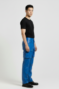 Side profile of Maverick Enzo leather cargo pants showing dimensional cargo pockets and straight leg fit. Maverick Jacket.