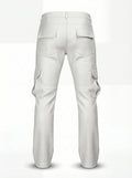 Rear view of white leather cargo pants showing rear flap pockets and horizontal knee seam construction. The Cassian by Maverick Jacket.