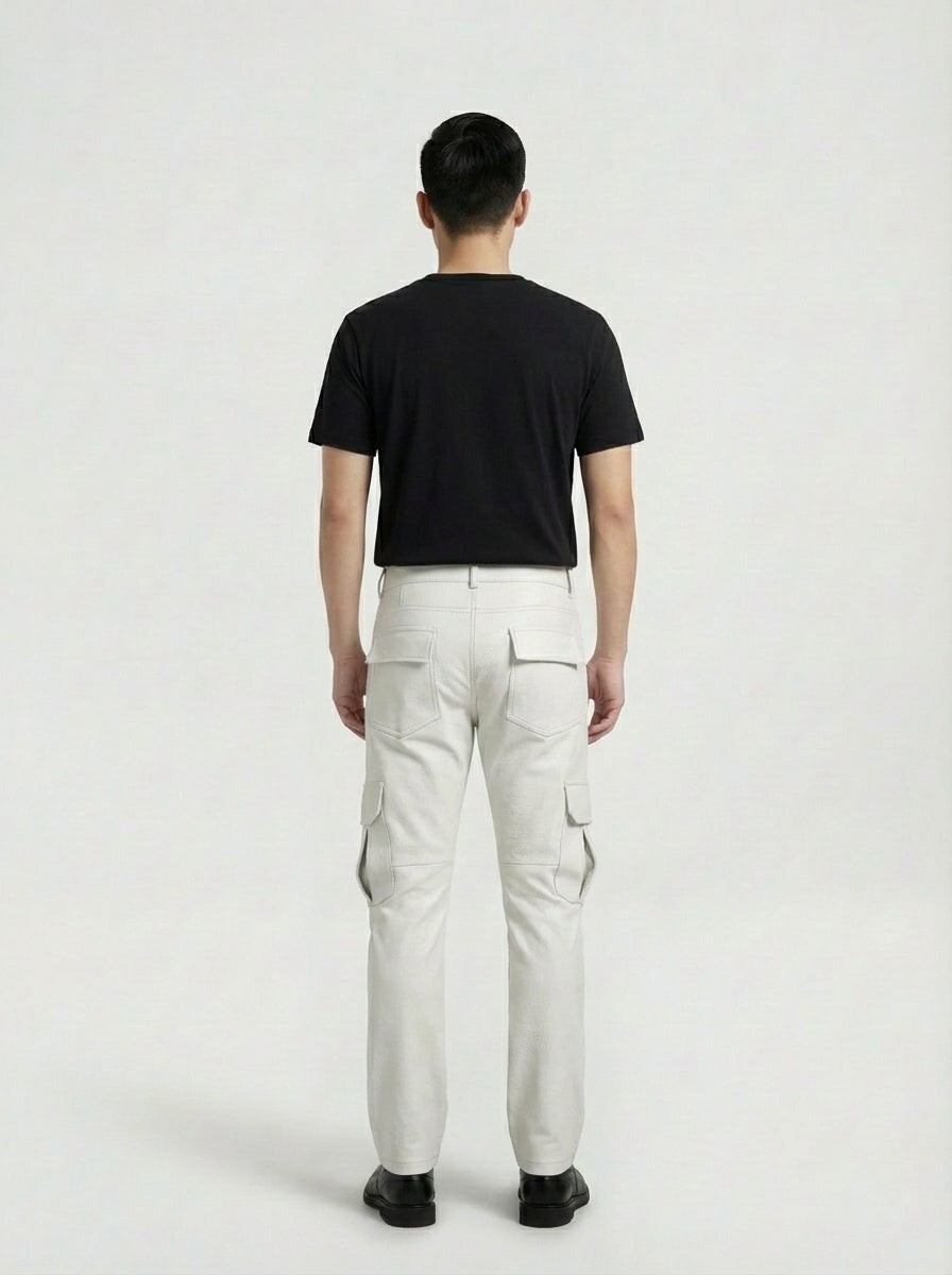 Rear view of male model wearing Maverick Cassian white leather cargo pants showing fitted seat silhouette and rear pocket styling. Maverick Jacket.