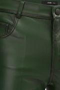 Macro shot of forest green leather grain and pocket rivet detail on pants. The Finnian by Maverick Jacket.