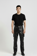 Male model wearing Maverick Tristan black leather cargo pants, straight fit, styled with black crew neck t-shirt and black leather derby shoes. Maverick Jacket.