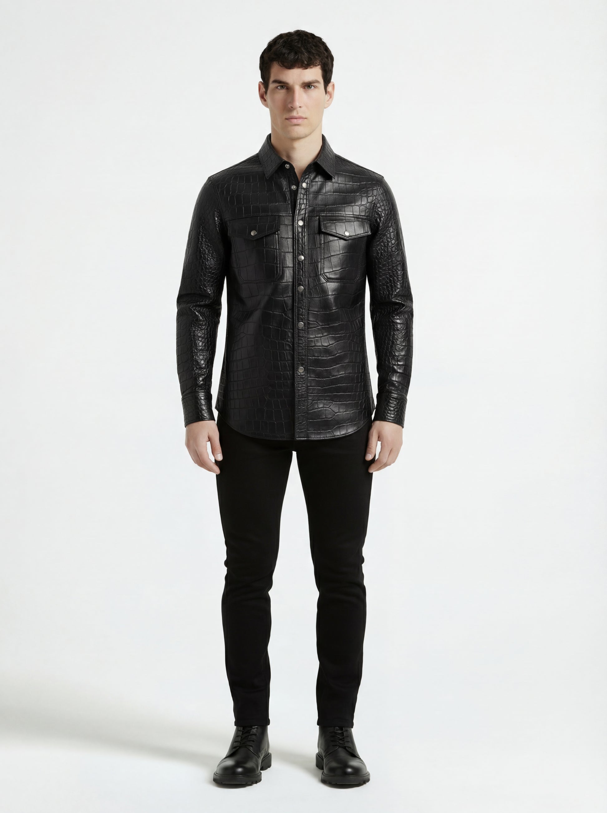 Male model wearing Maverick Damien croc-embossed leather shirt, slim fit, styled with black skinny jeans. Maverick Jacket.