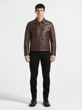 Male model wearing Maverick Elliot leather zip-front shirt, regular fit, styled with black skinny jeans. Maverick Jacket.