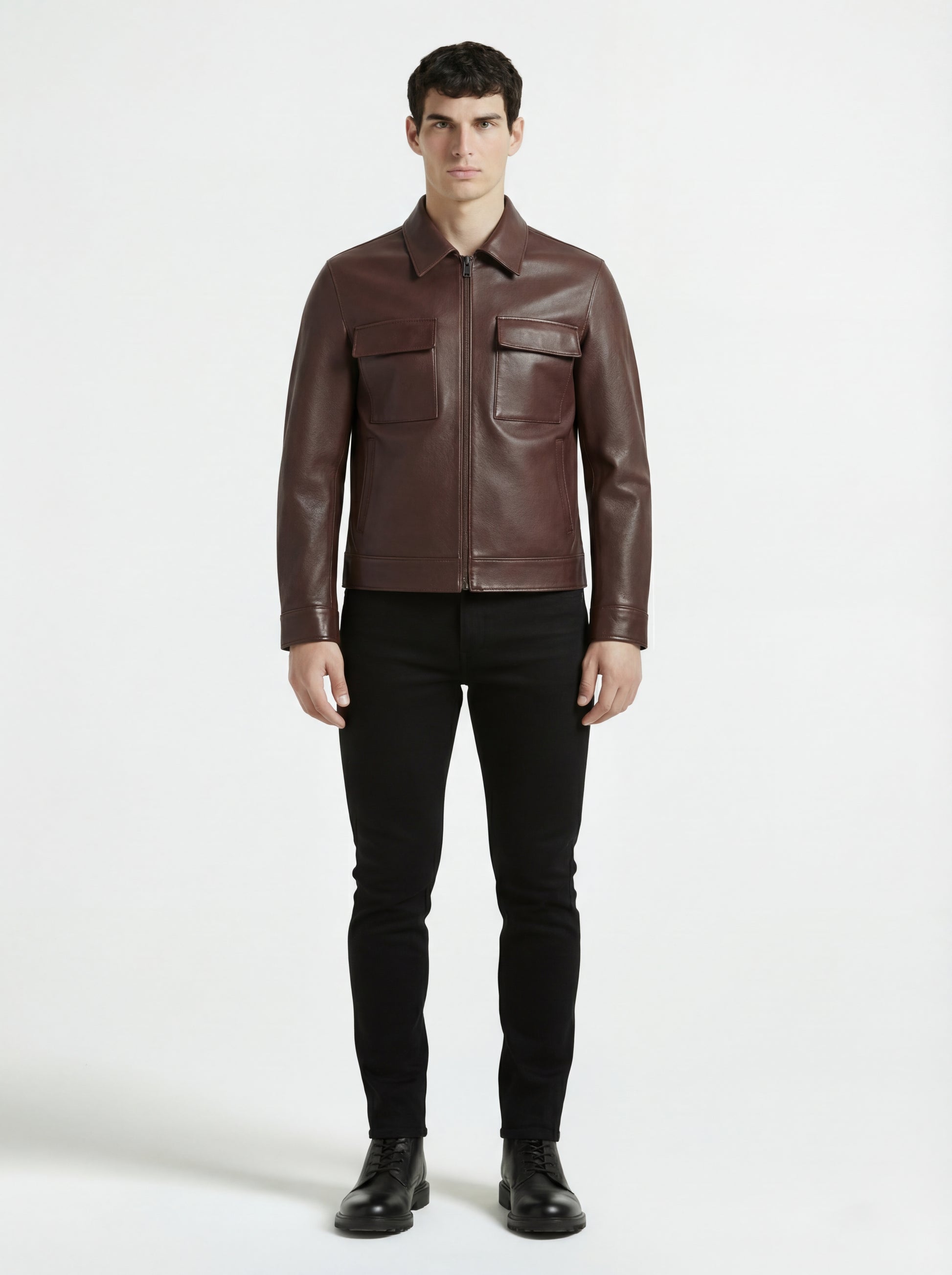 Male model wearing Maverick Elliot leather zip-front shirt, regular fit, styled with black skinny jeans. Maverick Jacket.