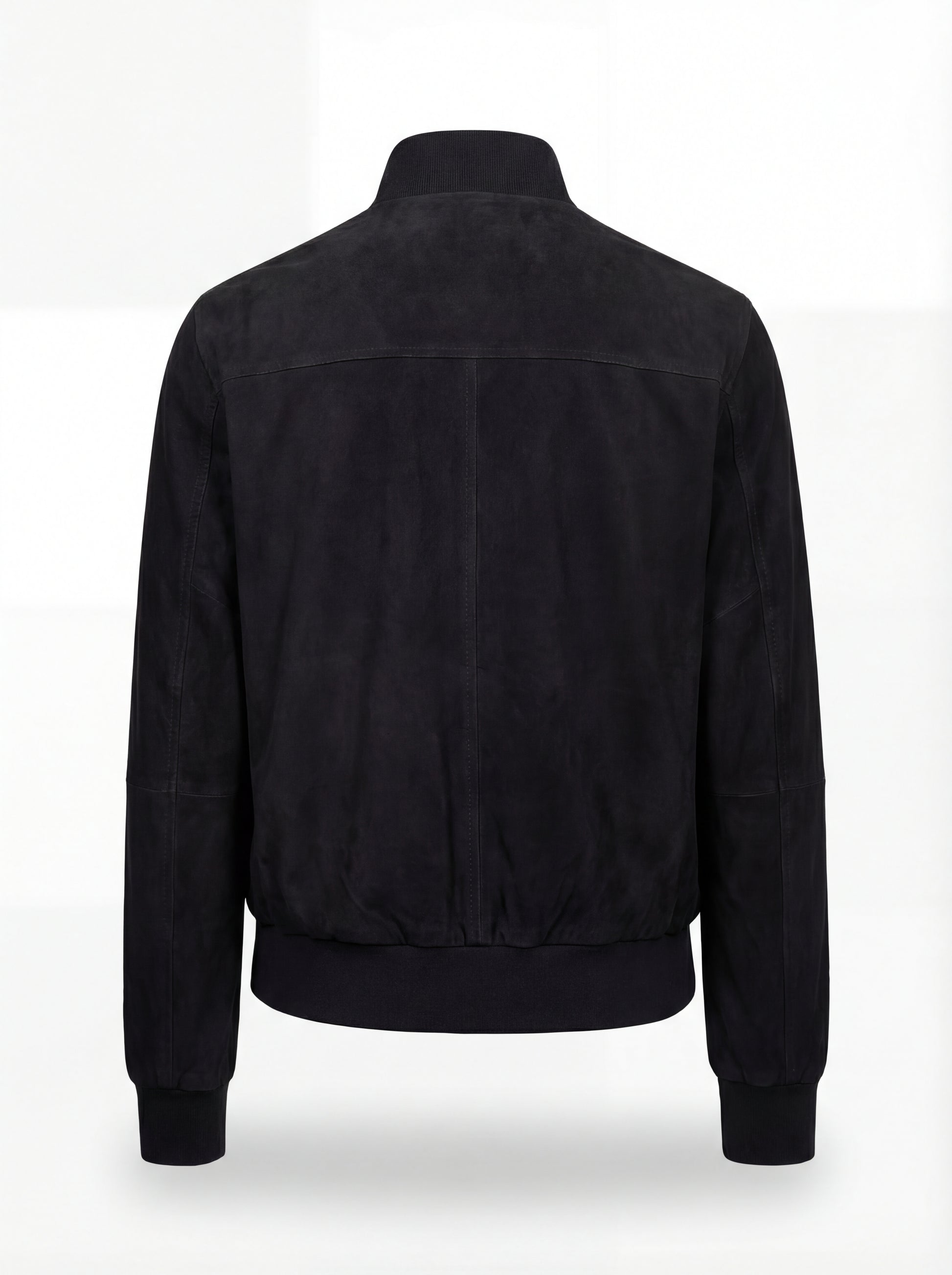 Rear view of black suede bomber jacket showing clean back paneling and ribbed hem. The Soren by Maverick Jacket.