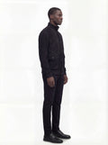 Side profile of Maverick Soren suede bomber jacket showing ribbed sleeve cuffs and classic bomber silhouette. Maverick Jacket.