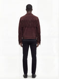 Rear view of male model wearing Maverick Boone suede fringe jacket showing broad shoulder fit and back fringe styling. Maverick Jacket.