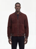 Male model wearing Maverick Miles suede bomber jacket, regular fit, styled with black jeans. Maverick Jacket.