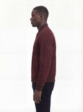 Side profile of Maverick Miles suede bomber jacket showing ribbed sleeve cuffs and classic bomber silhouette. Maverick Jacket.