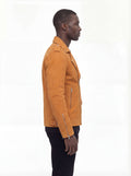 Side profile of Maverick Dylan suede biker jacket showing zippered sleeve cuffs and cropped silhouette. Maverick Jacket.