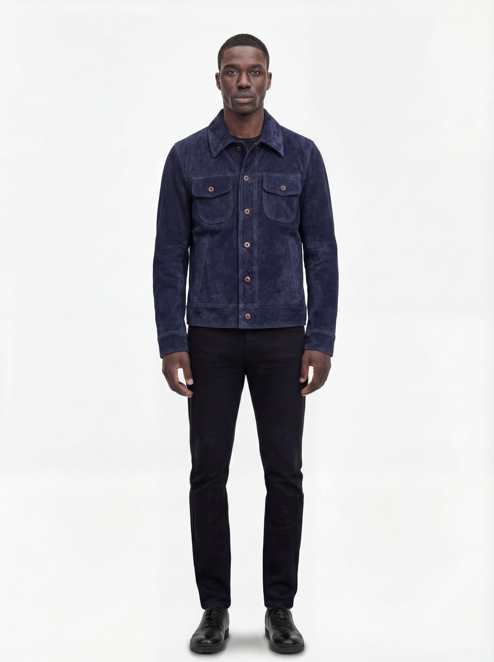 Male model wearing Maverick August suede trucker jacket, regular fit, styled with black jeans. Maverick Jacket.