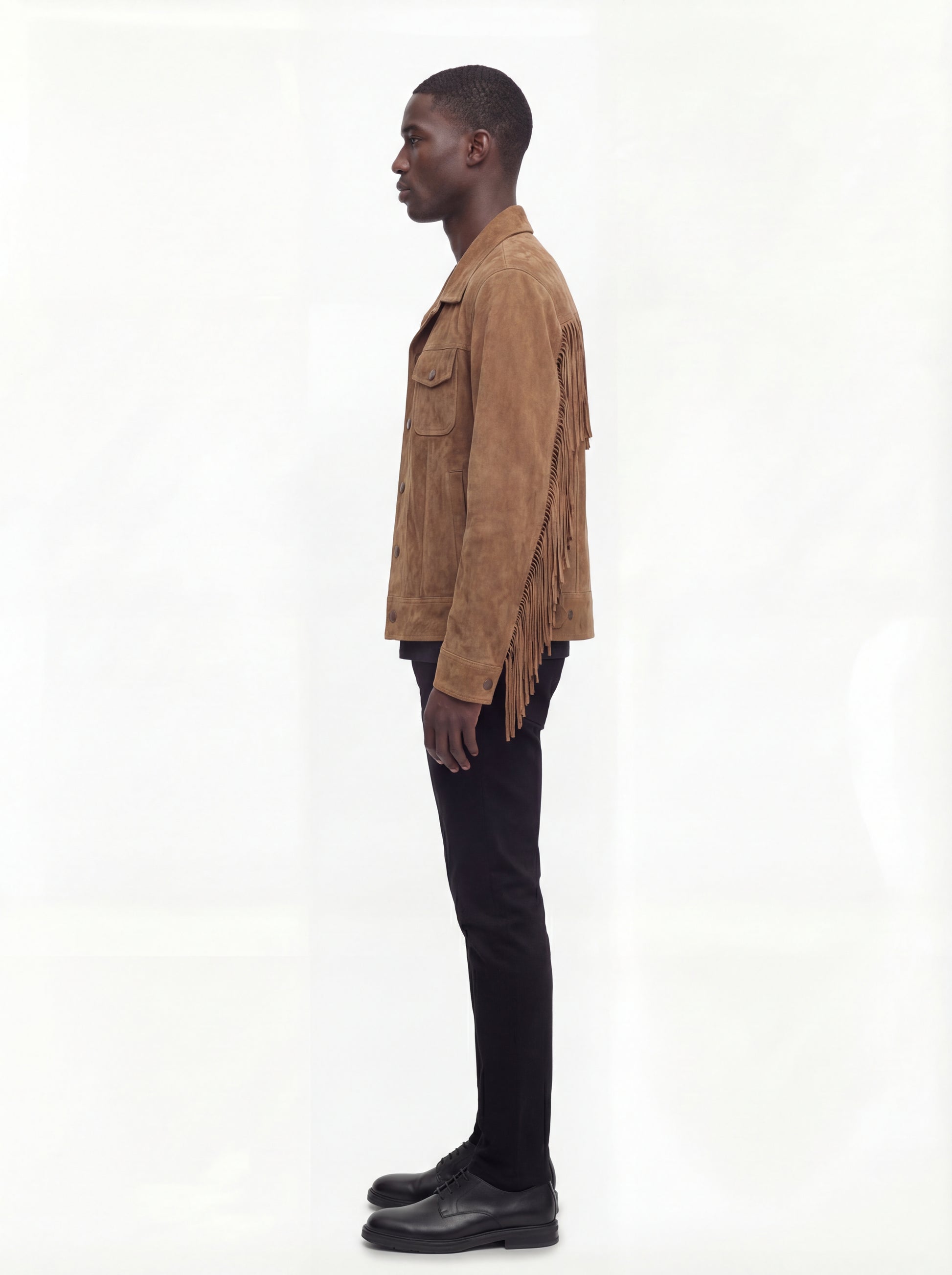 Side profile of Maverick Cassidy suede fringe jacket showing sleeve fringe movement and straight silhouette. Maverick Jacket.