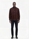 Male model wearing Maverick Arthur suede bomber jacket, regular fit, styled with black jeans. Maverick Jacket.