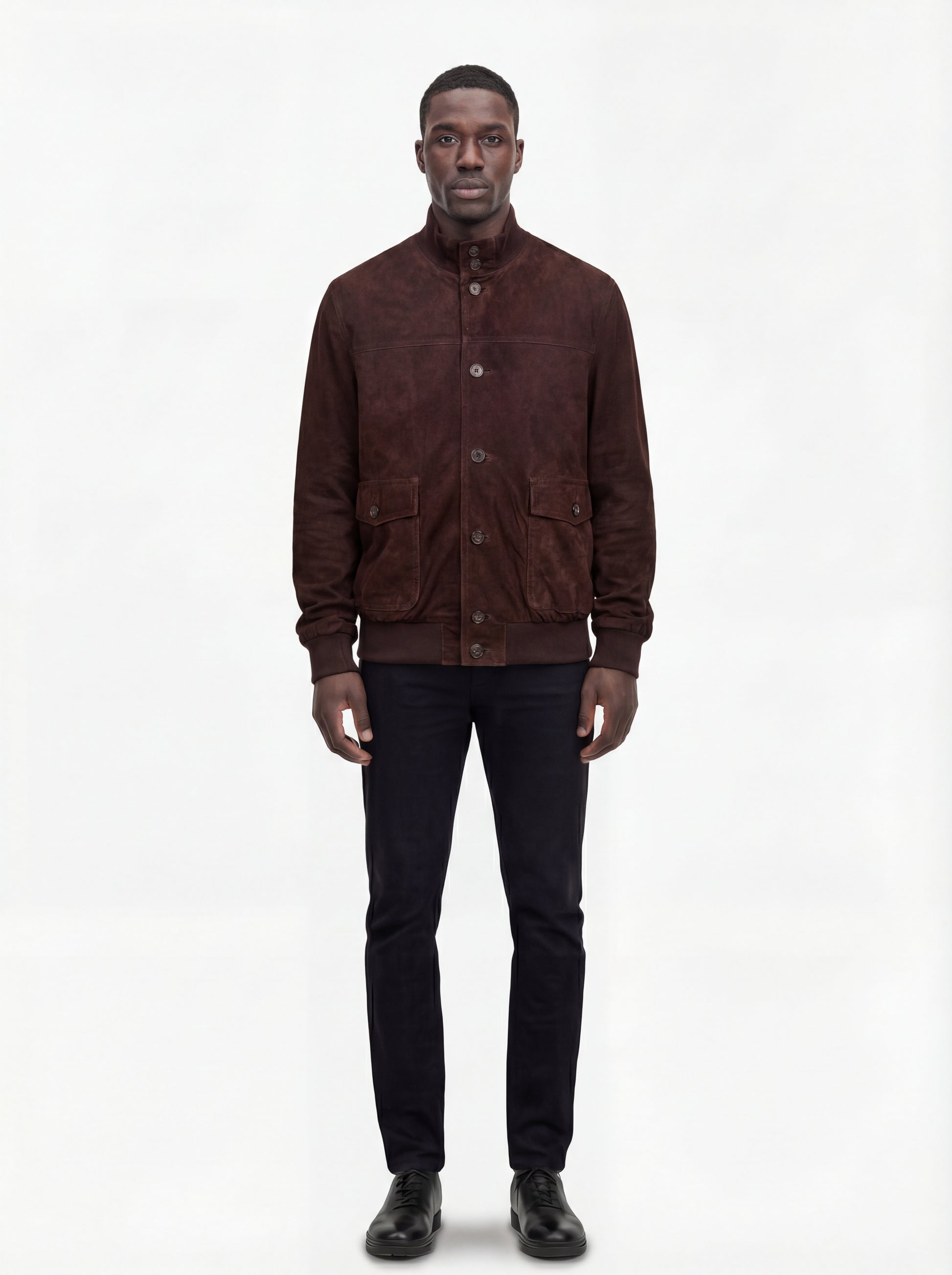 Male model wearing Maverick Arthur suede bomber jacket, regular fit, styled with black jeans. Maverick Jacket.
