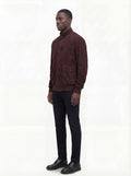 Side profile of Maverick Arthur suede bomber jacket showing ribbed sleeve cuffs and classic bomber silhouette. Maverick Jacket.
