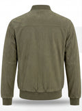 Rear view of olive green suede bomber jacket showing clean back paneling and ribbed hem. The Evan by Maverick Jacket.