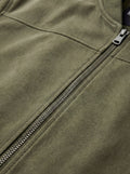 Macro shot of soft olive green suede texture and metal zipper hardware on bomber jacket. The Evan by Maverick Jacket.