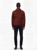 Rear view of male model wearing Maverick Rowan suede trucker jacket showing tailored shoulder fit and clean back paneling. Maverick Jacket.