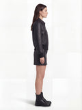 Side profile of Maverick Isla bomber jacket showing long sleeve structure and ribbed cuff detail. Maverick Jacket.