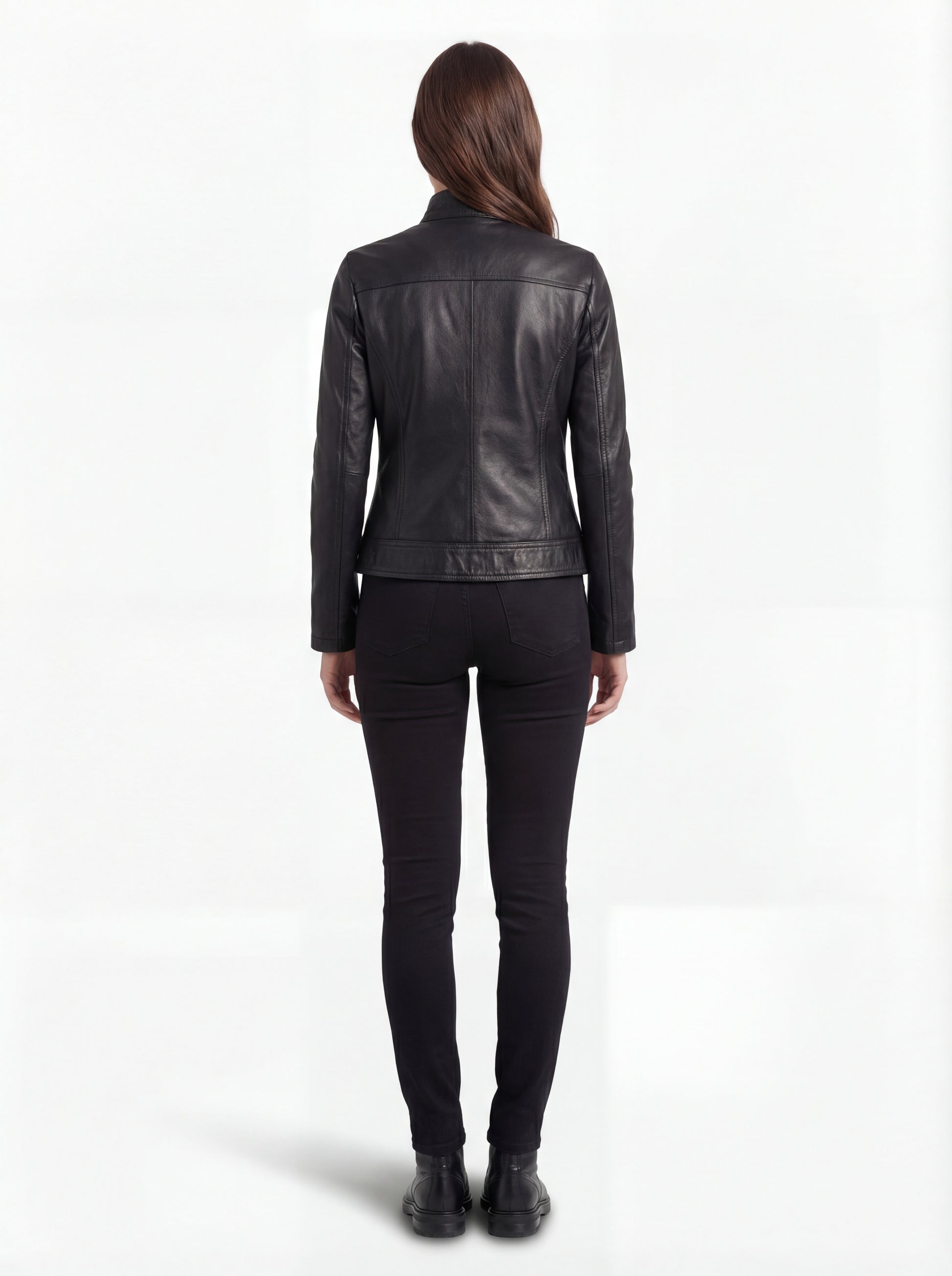 Rear view of female model wearing Maverick Maeve leather café racer jacket showing tailored back fit and clean shoulder yoke. Maverick Jacket.