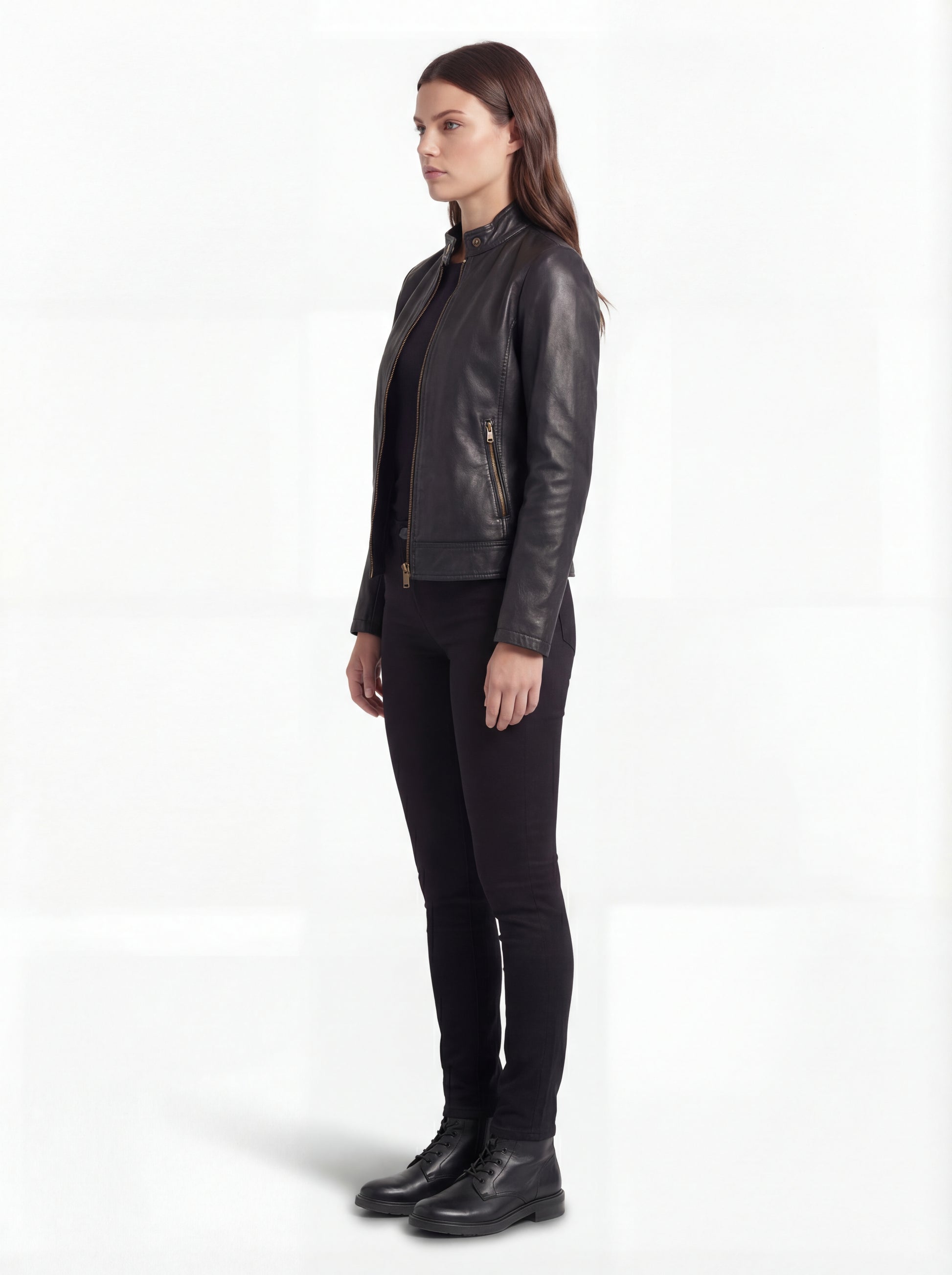 Side profile of Maverick Maeve café racer jacket showing fitted sleeve structure and hip-length silhouette. Maverick Jacket.
