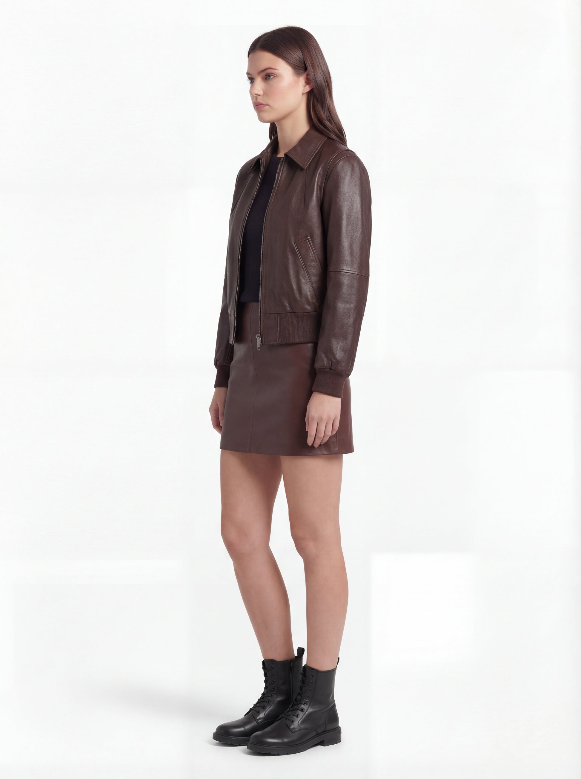 Side profile of Maverick Isla bomber jacket showing long sleeve structure and ribbed cuff detail. Maverick Jacket.