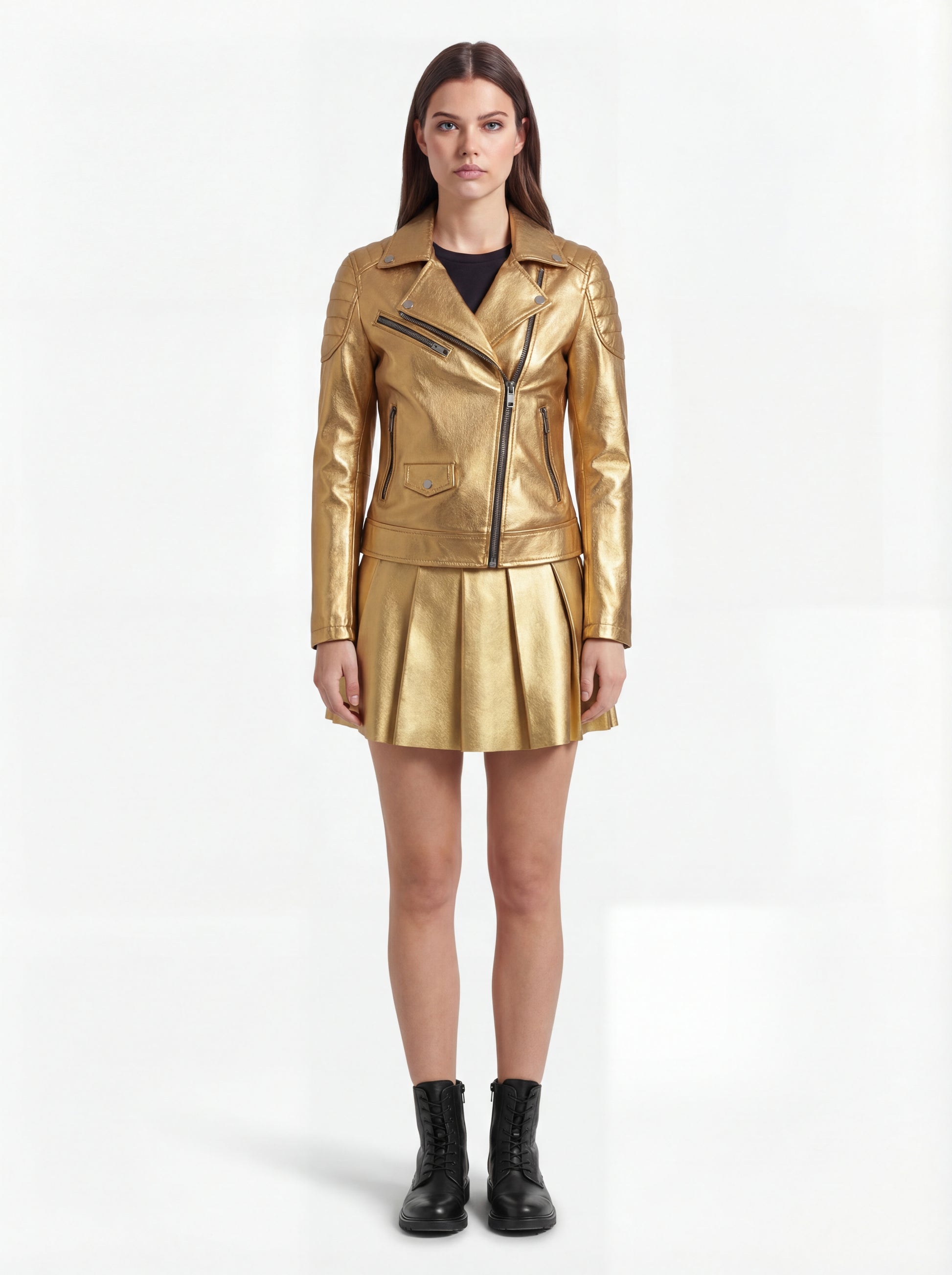 Female model wearing Maverick Aurora leather biker jacket, slim fit, styled with Maverick Poppy metallic gold pleated leather skirt. Maverick Jacket.
