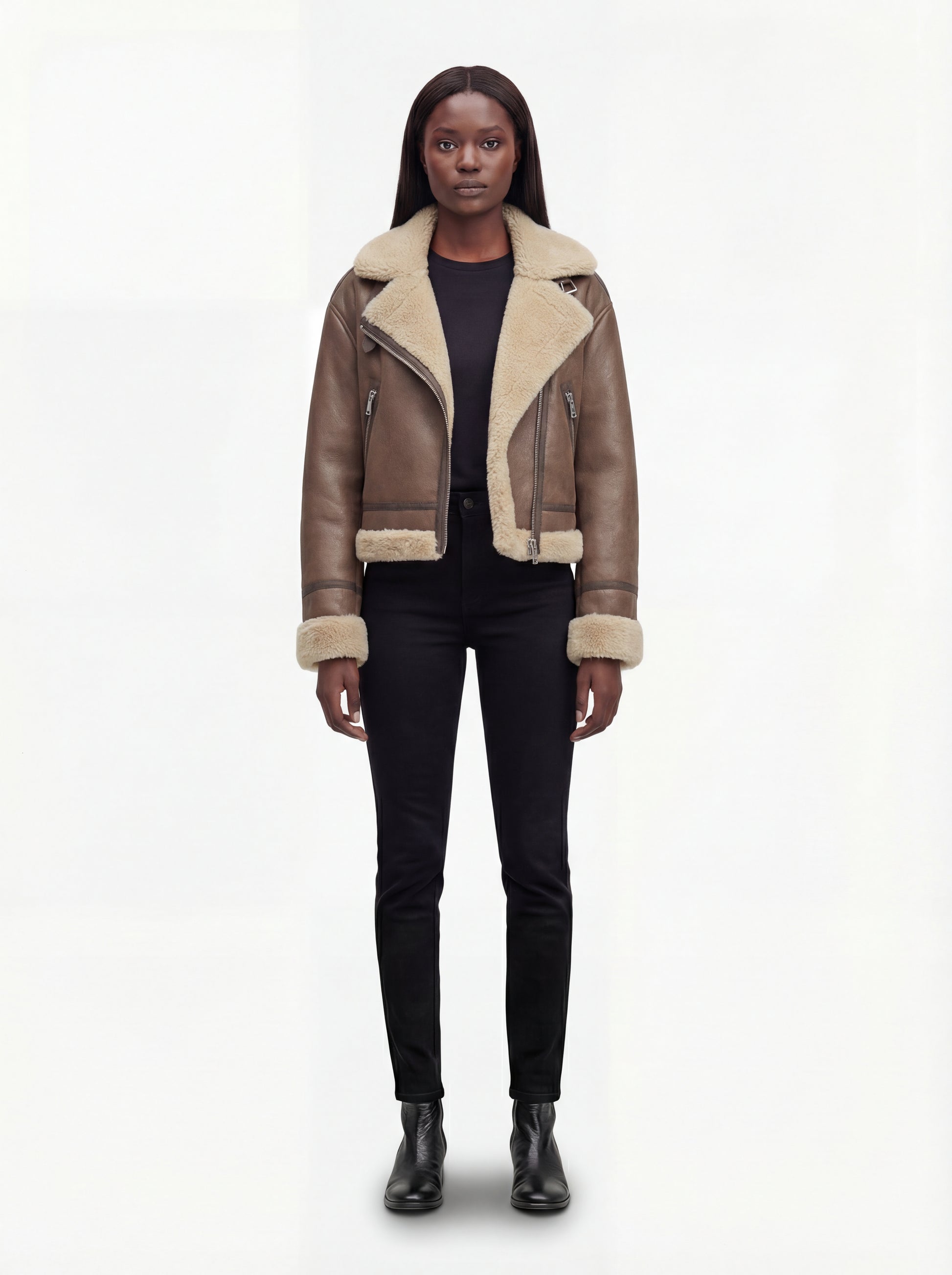 Female model wearing Maverick Amelia aviator jacket, relaxed fit, styled with black skinny jeans and leather ankle boots. Maverick Jacket.