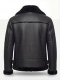 Rear view of black leather aviator jacket showing horizontal yoke paneling and buckled side waist tabs. Maverick Nova.