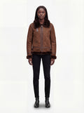 Female model wearing Maverick Eliza aviator jacket, regular fit, styled with black skinny jeans and leather ankle boots. Maverick Jacket.
