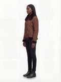 Side profile of Maverick Eliza aviator jacket showing suede sleeve structure and relaxed silhouette. Maverick Jacket.