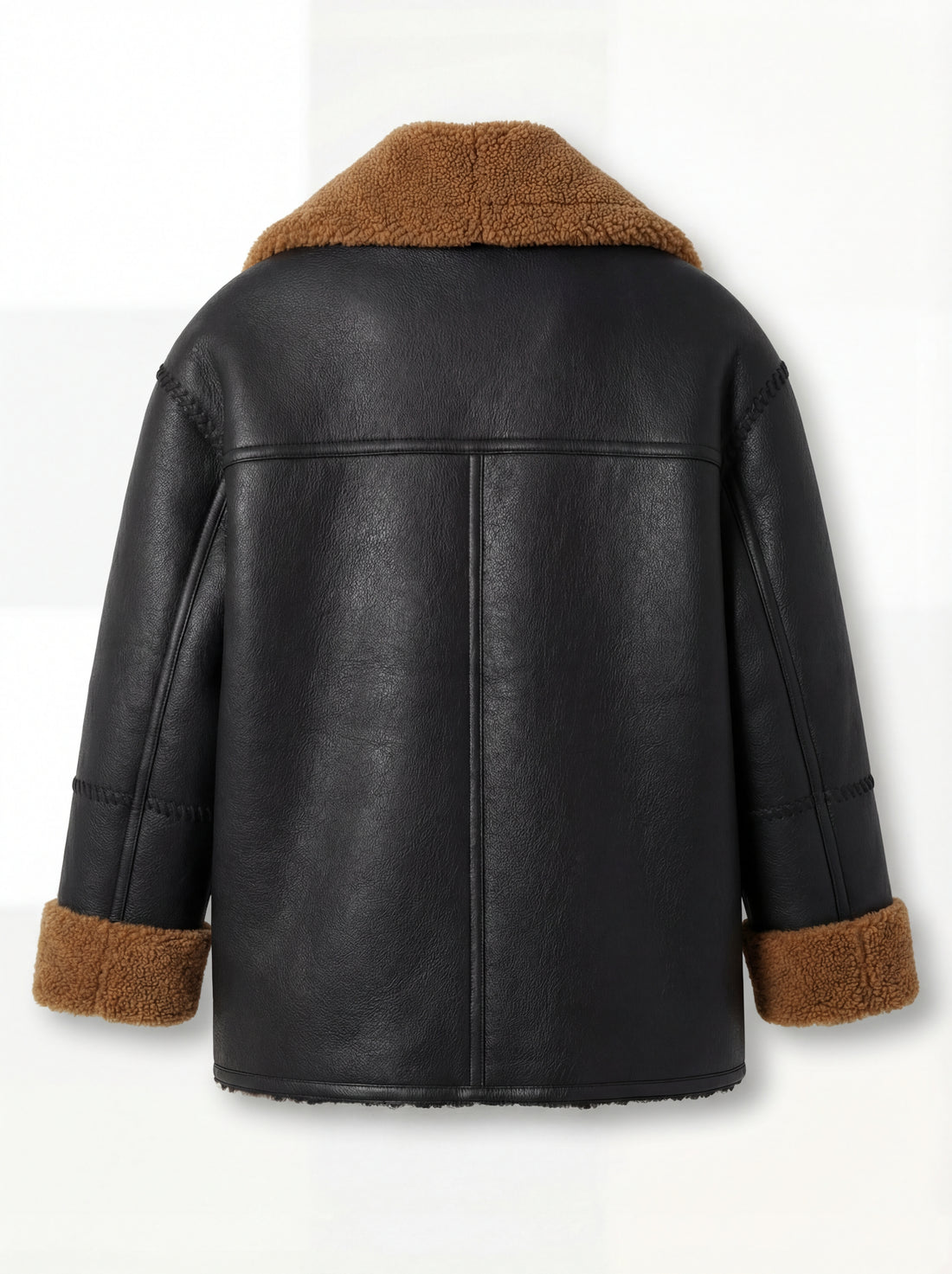 Women's black and tan shearling jacket with braided whipstitch detailing and asymmetric zipper closure, Front View. Maverick Noa.