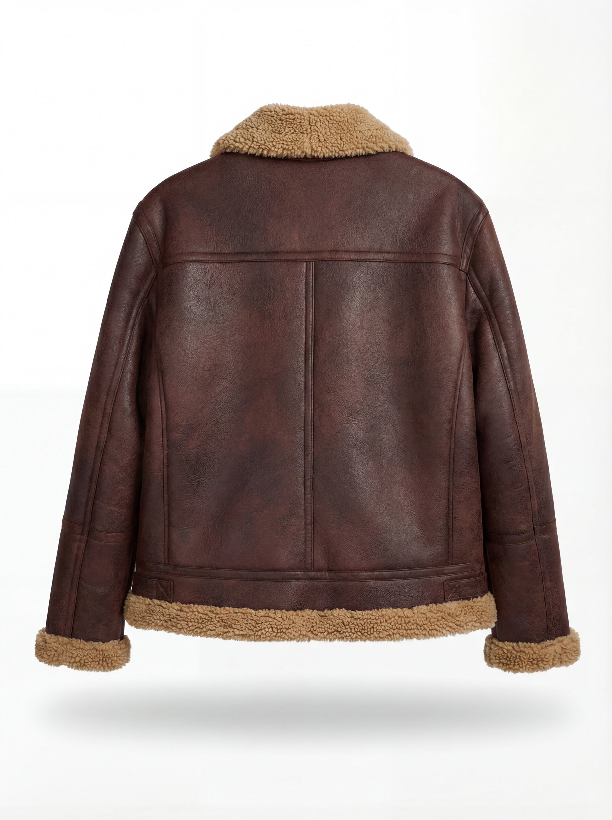 Rear view of brown distressed leather aviator jacket showing vertical center seam and shearling hem trim. Maverick Sierra.