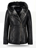 Women's black leather hooded shearling coat with plush fur lining and exposed zipper cuffs, Front View. The Genevieve by Maverick Jacket.