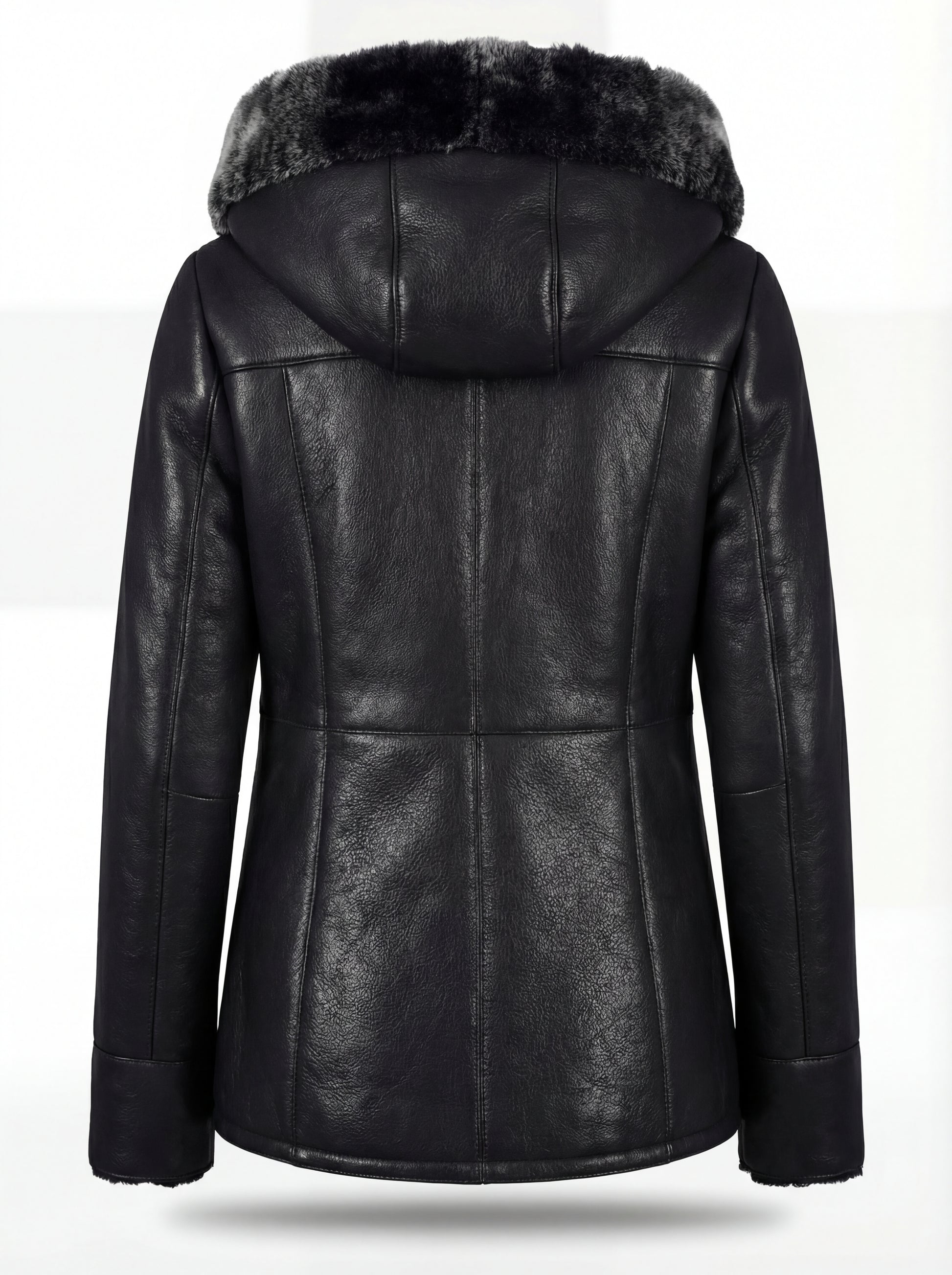 Rear view of black leather shearling coat showing contoured back paneling and hood structure. The Genevieve by Maverick Jacket.