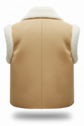 Rear view of tan shearling vest showing vertical center seam and cream wool armhole trim. The Elle by Maverick Jacket.