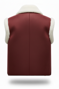 Rear view of burgundy shearling vest showing vertical center seam and cream wool armhole trim. The Elle by Maverick Jacket.